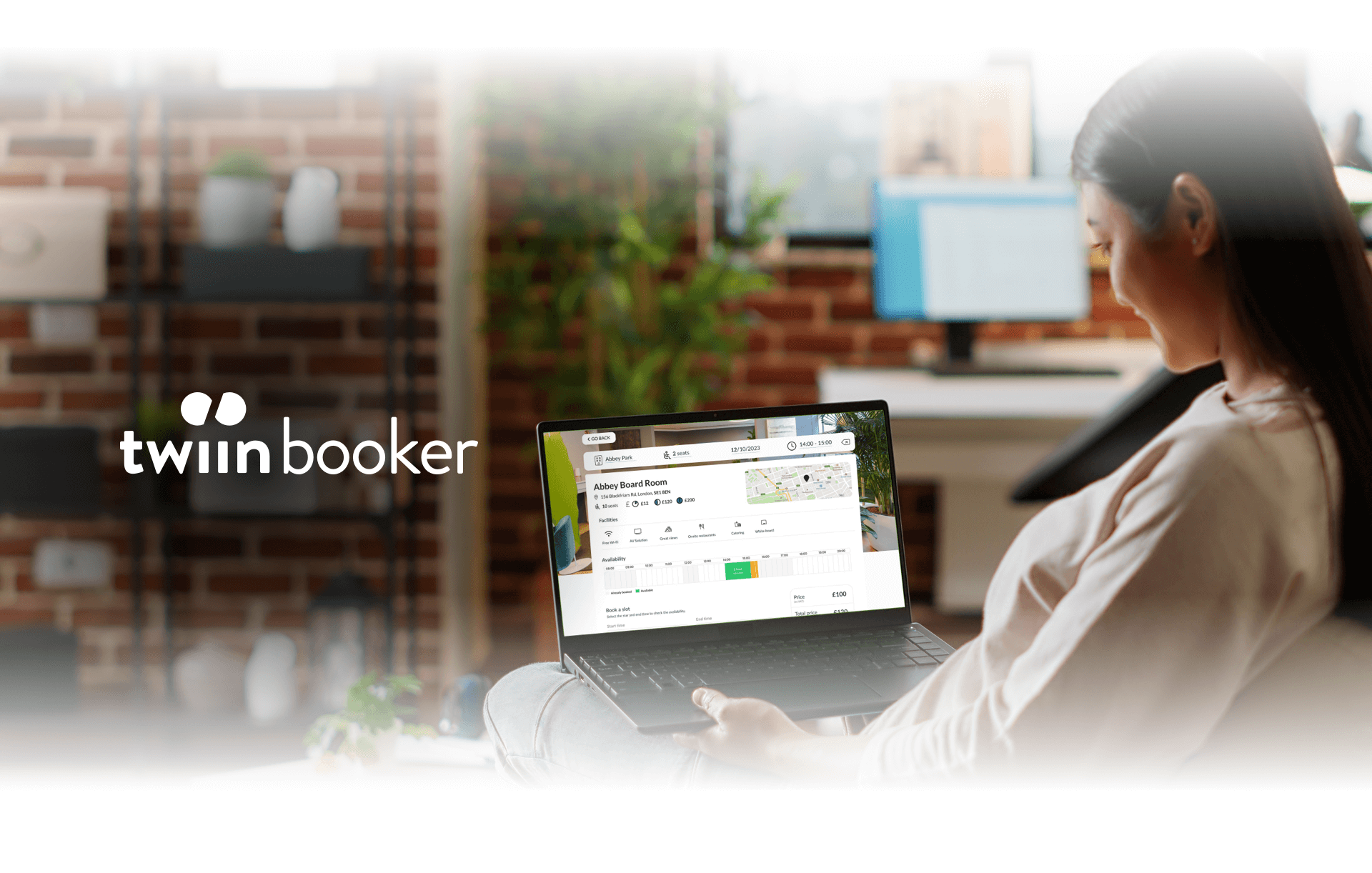 twiinbooker booking calendar shown on a laptop in a workspace