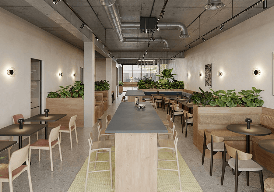 Clockwise workspace café with long tables and plants
